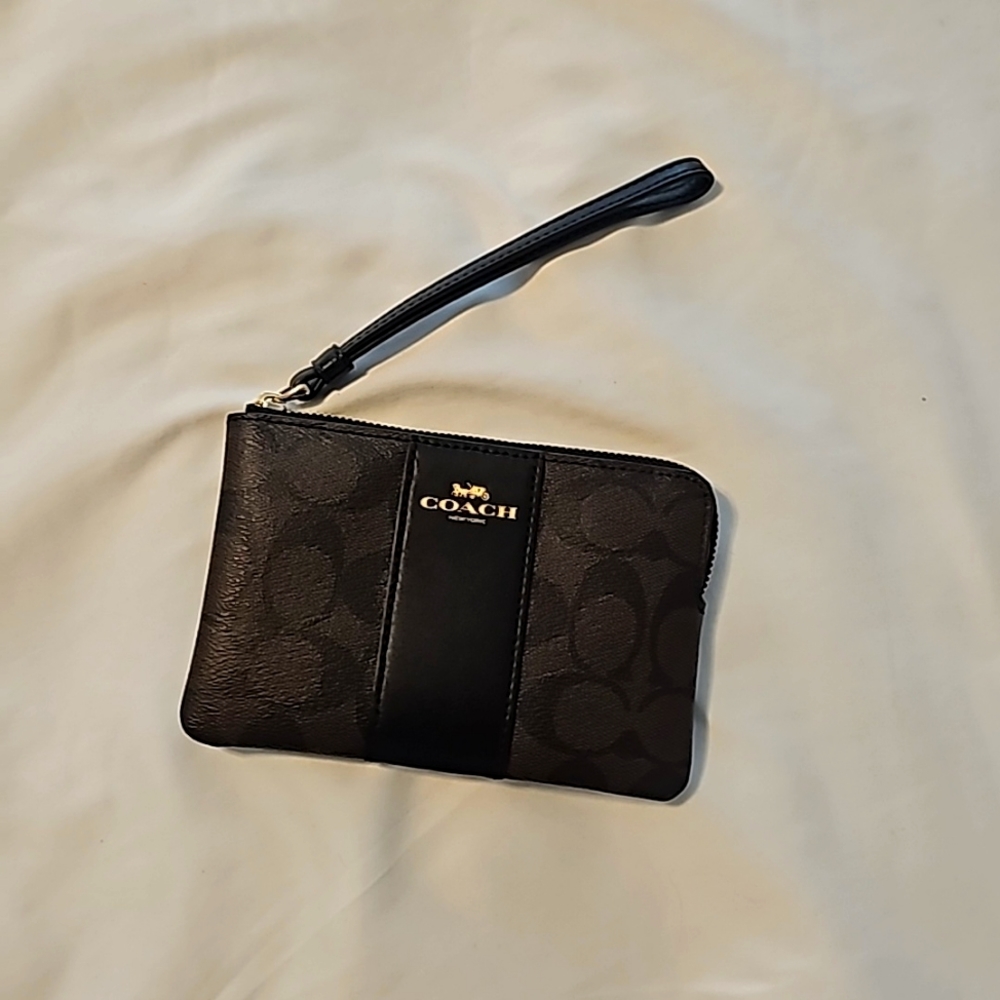 Brown and Black Coach Wristlet